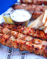 Souvlaki GR signature dishes Chicken or Pork Pita
Horiatiki
Individual Skewers